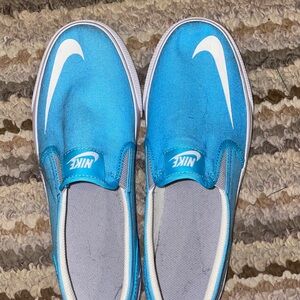 Nike Turquoise Slip-On Shoes with White Swoosh